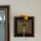 壁掛け仏壇「鏡壇ミラリエ」に今日（10/5）の誕生花のイエローコスモスを飾ってみました。