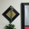 壁掛け仏壇「鏡壇ミラリエ」に今日（12/28）の誕生花の「ラークスパー」を飾ってみました。