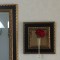 壁掛け仏壇「鏡壇ミラリエ」に今日（1/26）の誕生花の「赤いゼラニウム」を飾ってみました。