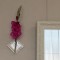 壁掛け仏壇「鏡壇ミラリエ」に今日（3/29）の誕生花の「ピンク色のグラジオラス」を飾ってみました。