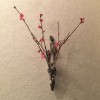 壁掛け仏壇「鏡壇ミラリエ」に今日（3/2）の誕生花のモモ（桃）の花を飾ってみました。