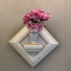 壁掛け仏壇「鏡壇ミラリエ」に今日（6/17）の誕生花の「ピンクのバラ（薔薇）」を飾ってみました。