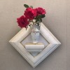 壁掛け仏壇「鏡壇ミラリエ」に今日（7/15）の誕生花の「赤い薔薇」を飾ってみました。