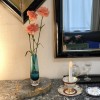 壁掛け仏壇「鏡壇ミラリエ」に今日（10/11）の誕生花の「カーネーション（麝香撫子）」を飾ってみました。