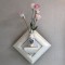 壁掛け仏壇「鏡壇ミラリエ」に今日（11/8）の誕生花の「プリマドンナ（八重咲土耳古桔梗）」を飾ってみました。