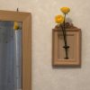 壁掛け仏壇「鏡壇ミラリエ」に今日（1/20）の誕生花の「黄色のラナンキュラス（花金鳳花）」を飾ってみました。