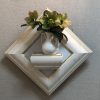壁掛け仏壇「鏡壇ミラリエ」に今日（3/6）の誕生花の「薄緑色のクリスマスローズ（寒芍薬）」を飾ってみました。