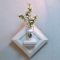 壁掛け仏壇「鏡壇ミラリエ」に今日（4/19）の誕生花のコデマリ（小手毬）」を飾ってみました。