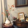 壁掛け仏壇「鏡壇ミラリエ」に今日（7/29）の誕生花の「モントブレチア（姫檜扇水仙）」を飾ってみました。