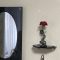 壁掛け仏壇「鏡壇ミラリエ」に今日（1/21）の誕生花の「赤い カーネーション（麝香撫子）」を飾ってみました。