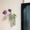 壁掛け仏壇「鏡壇ミラリエ」に今日（3/20）の誕生花の「紫のチューリップ（鬱金香）」を飾ってみました。