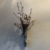 壁掛け仏壇「鏡壇ミラリエ」に今日（4/2）の誕生花の「サクラ（桜）」を飾ってみました。