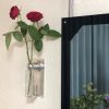 壁掛け仏壇「鏡壇ミラリエ」に今日（6/12）の誕生花の「赤いバラ（薔薇）」を飾ってみました。