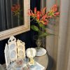 壁掛け仏壇「鏡壇ミラリエ」に今日（10/19）の誕生花の「グロリオサ（狐百合）」を飾ってみました。