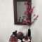 壁掛け仏壇「鏡壇ミラリエ」に今日（1/6）の誕生花の「マンサク（満作）」を飾ってみました。