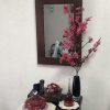 壁掛け仏壇「鏡壇ミラリエ」に今日（1/6）の誕生花の「マンサク（満作）」を飾ってみました。