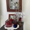 壁掛け仏壇「鏡壇ミラリエ」に今日（4/30）の誕生花の「フジ（藤）」を飾ってみました。