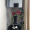 壁掛け仏壇「鏡壇ミラリエ」に今日（5/8）の誕生花の「シャクナゲ（石楠花）」を飾ってみました。