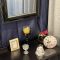 壁掛け仏壇「鏡壇ミラリエ」に今日（11/27）の誕生花の「セロシアキャンドル（槍鶏頭）」を飾ってみました。